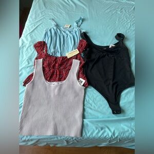 3 NWT tops and 1 NWT bodysuit